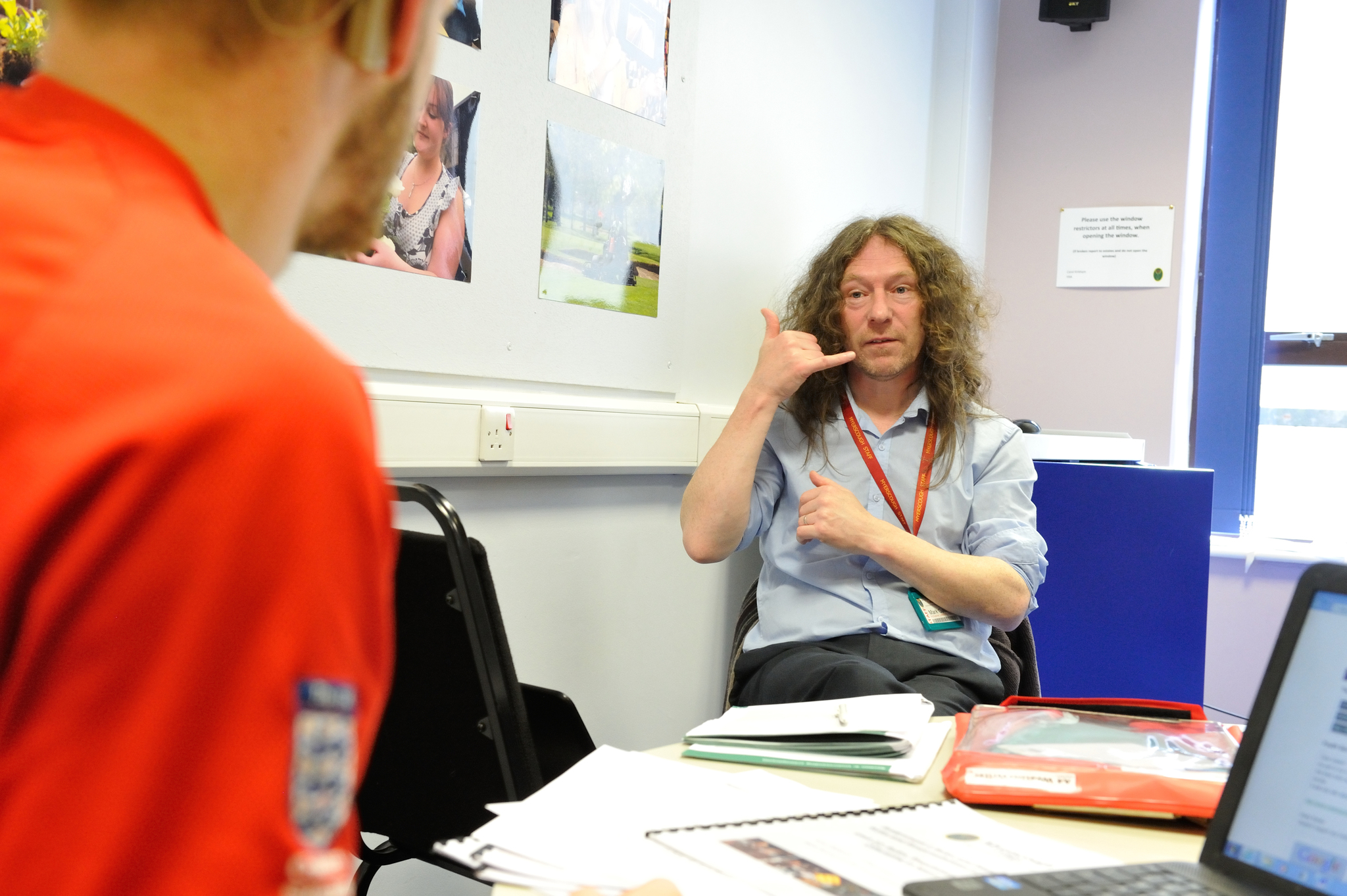 Myerscough College tutor communicating with a student using British Sign Language