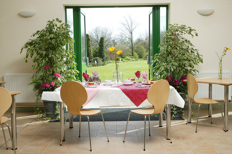 A table set up for afternoon tea in the Garden House Tea Rooms