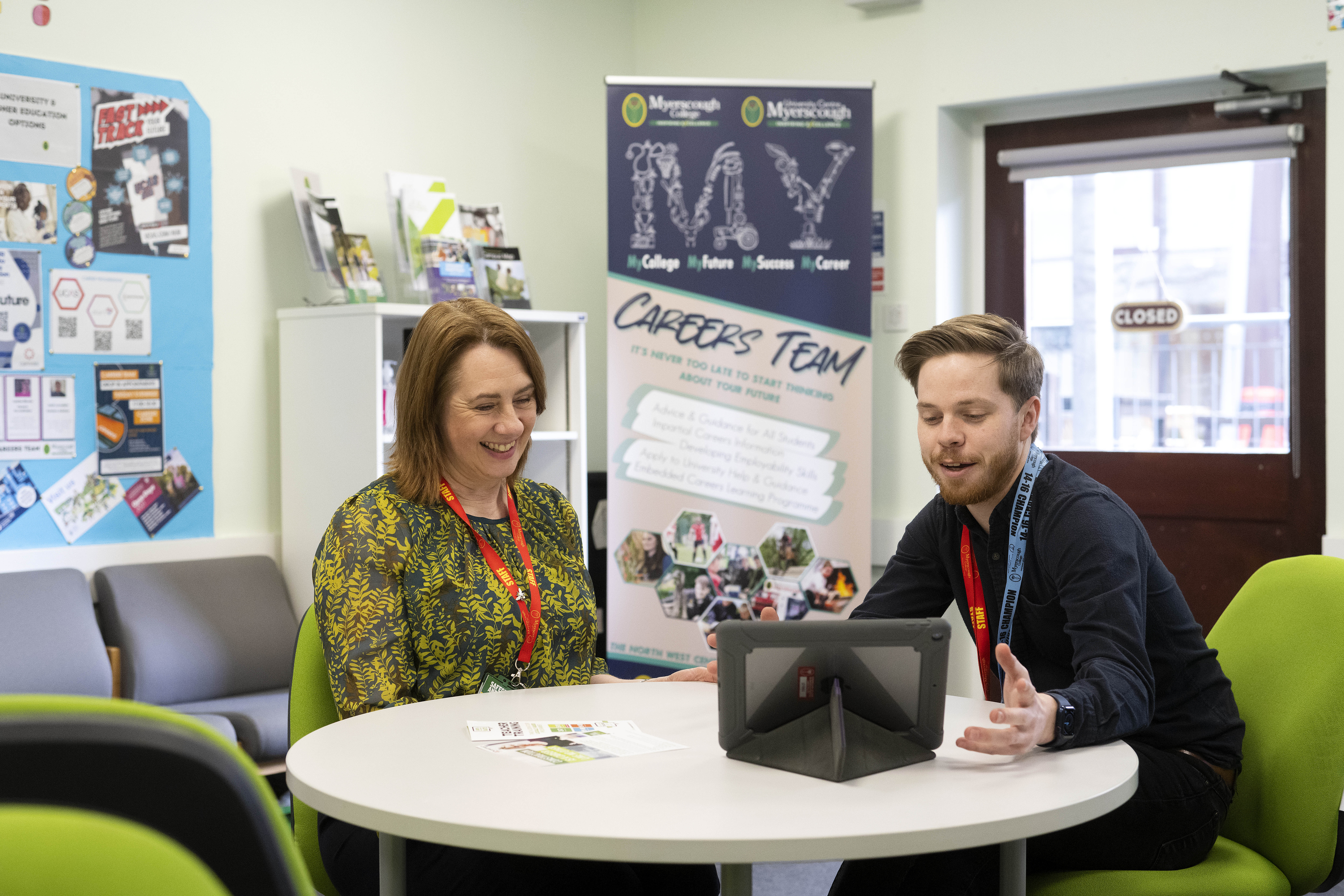 Two Myerscough College members of staff in the careers zone
